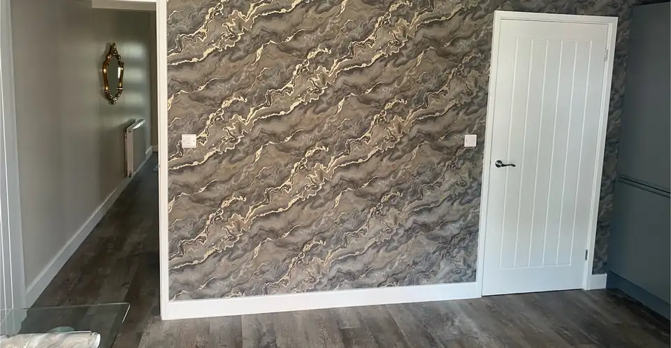 Grey and gold marble-effect feature wallpaper hung by GW Decorating, painter and decorator in Cleckheaton